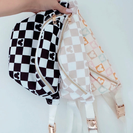 Two patterned bags held together against a light background