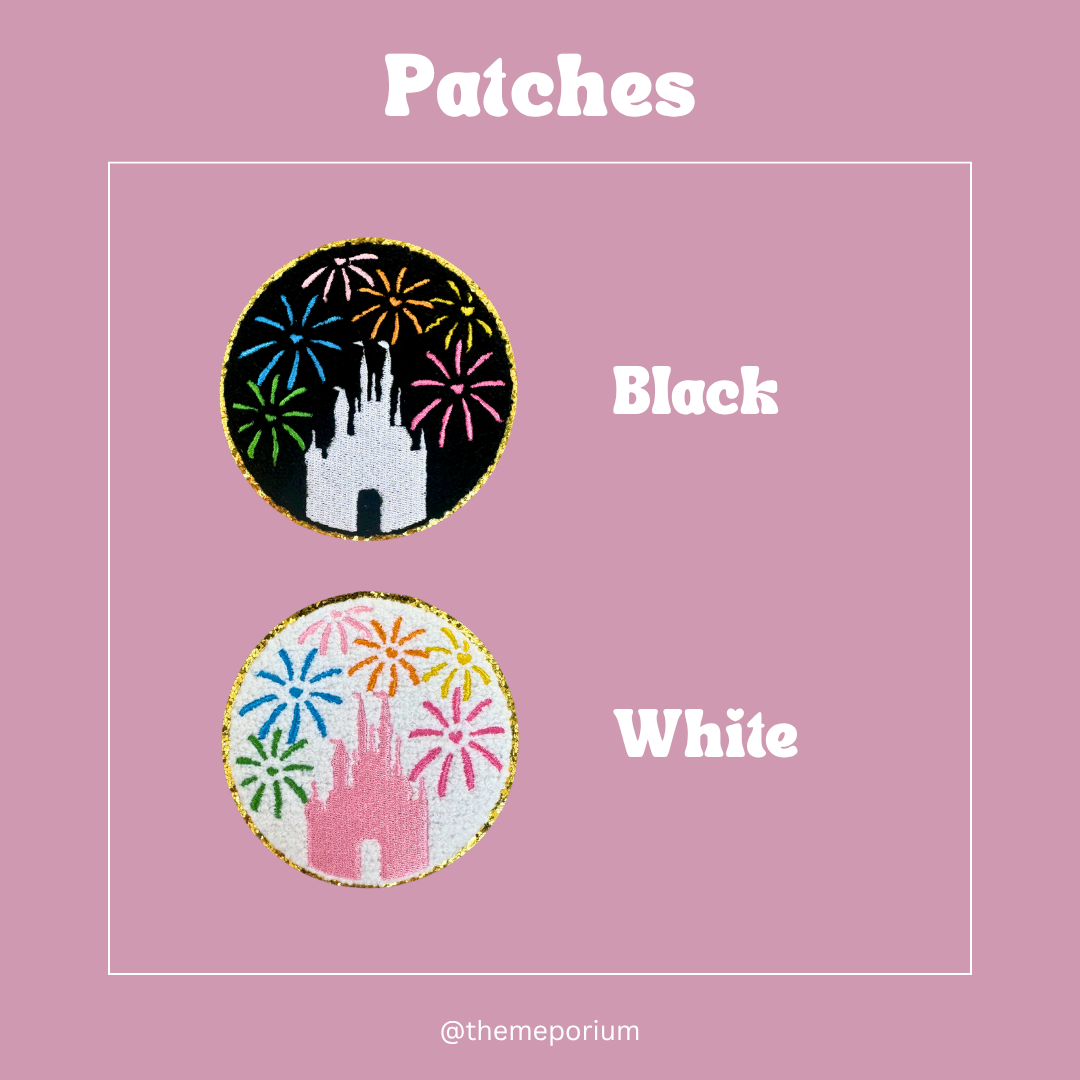 Two patches with castle designs, one black and one white, on a pink background